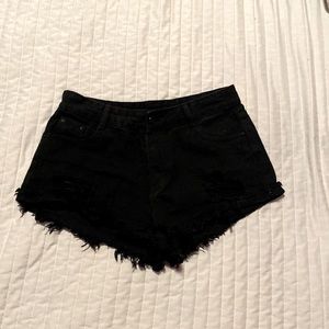 black ripped Jean shorts